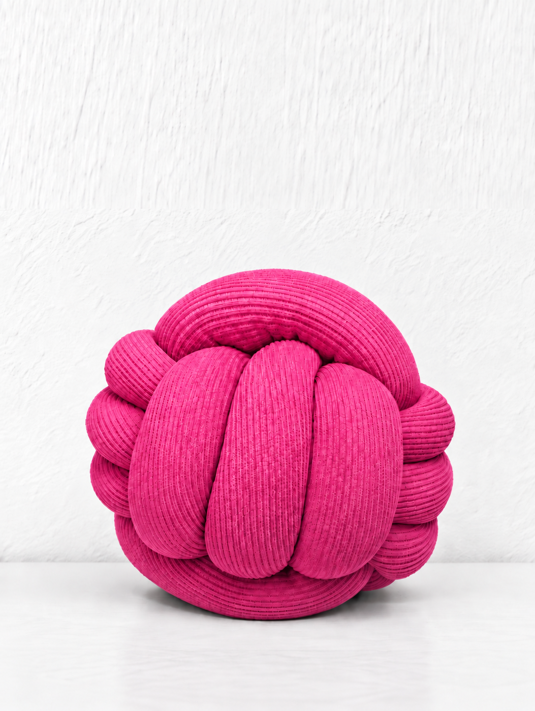 Coussin boule tressé