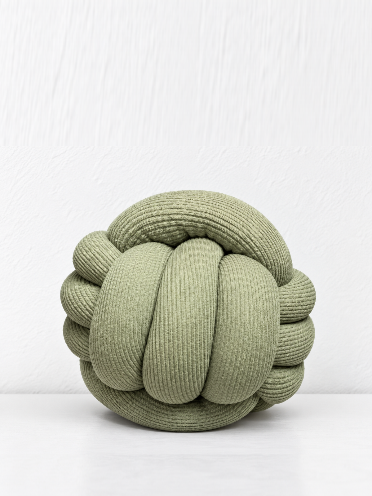 Coussin boule tressé