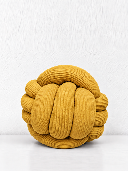 Coussin boule tressé