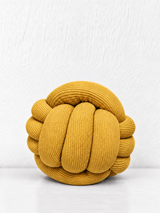 Coussin boule tressé